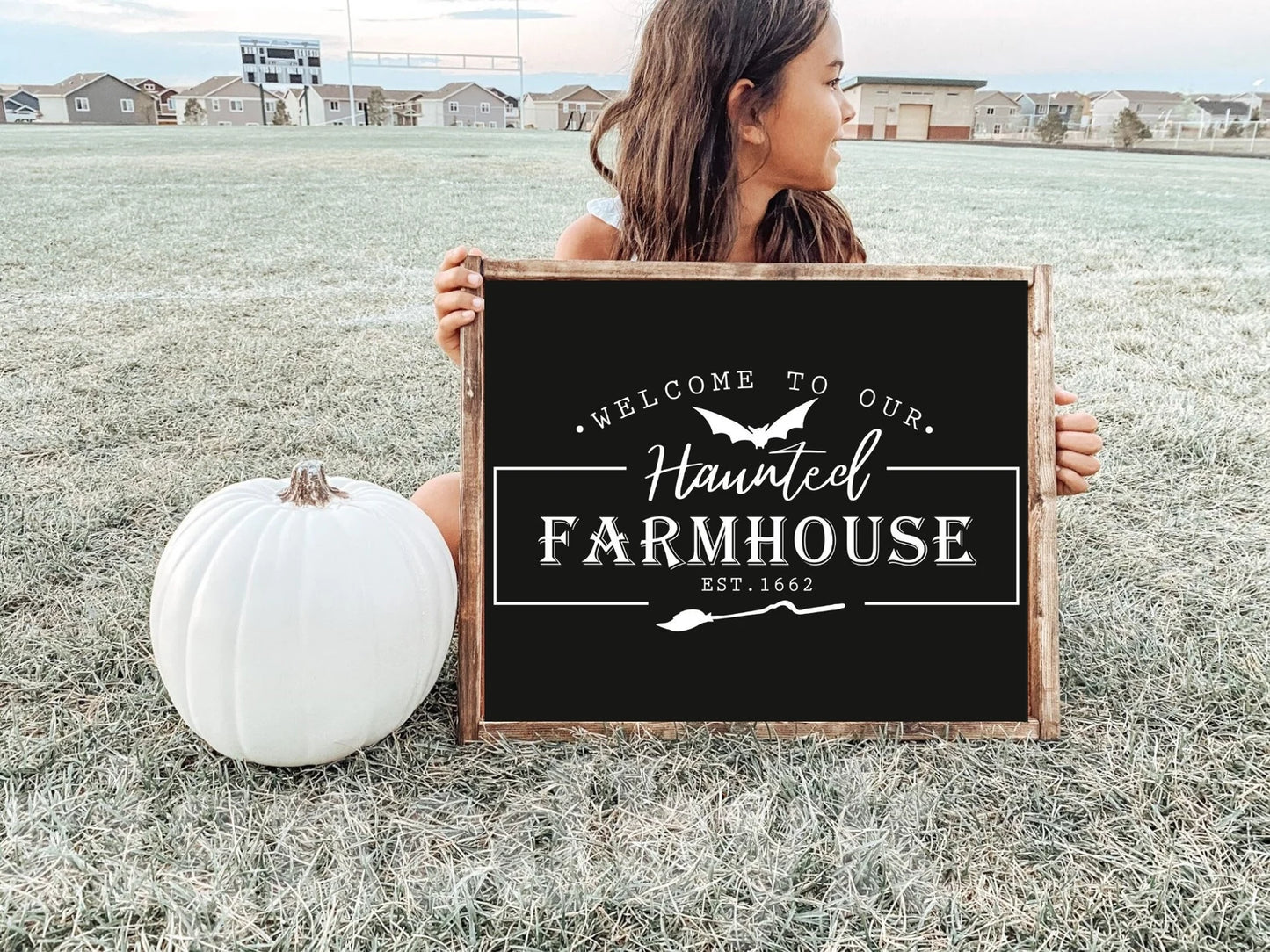 Welcome to our haunted farmhouse wood sign