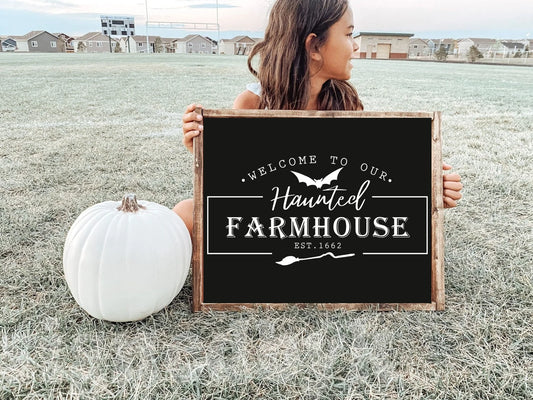 Welcome to our haunted farmhouse wood sign